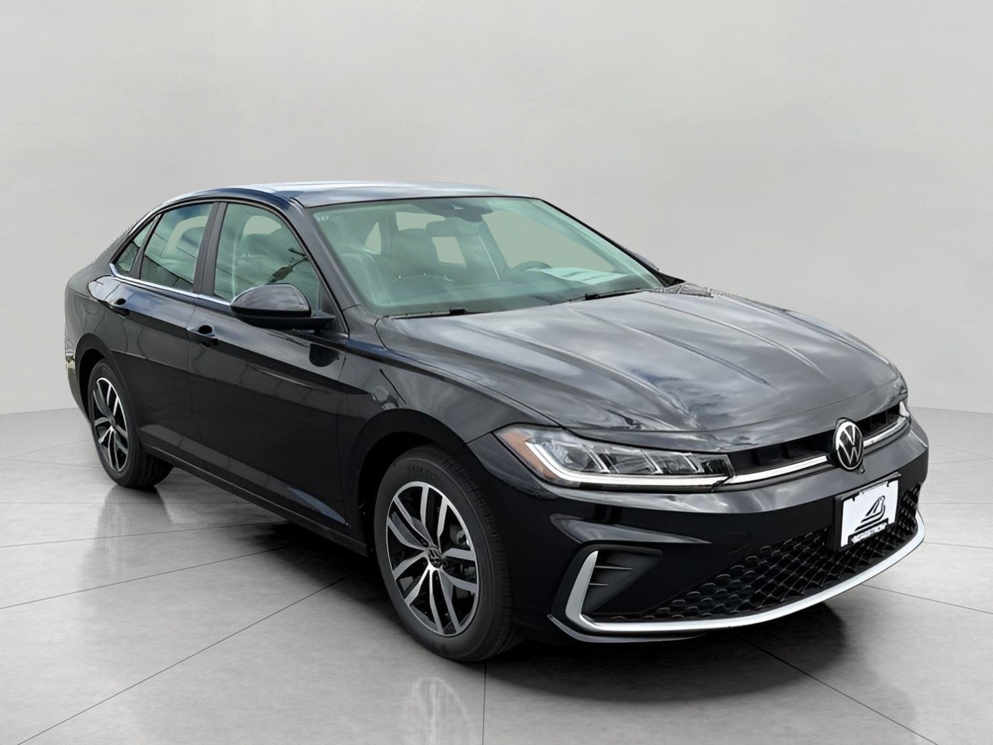 2026 Volkswagen Jetta SE Auto in Deep Black Pearl — front three-quarter view